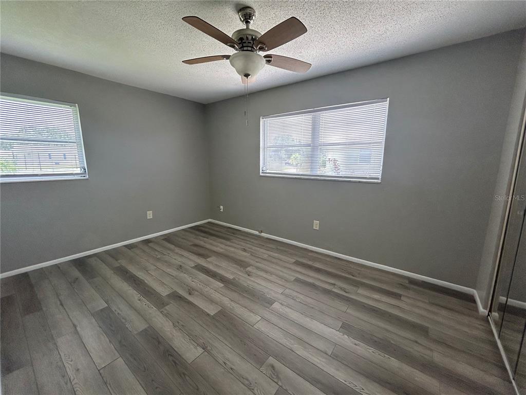8521 Pickwick Road North Port, FL 34287 - Photo 17 of 19 a view of an empty room with a window