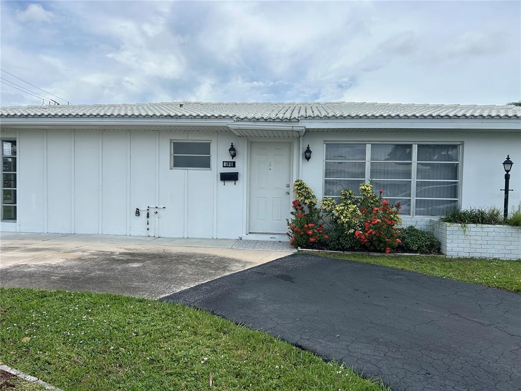 8521 Pickwick Road North Port, FL 34287 - Photo 2 of 19 a front view of a house