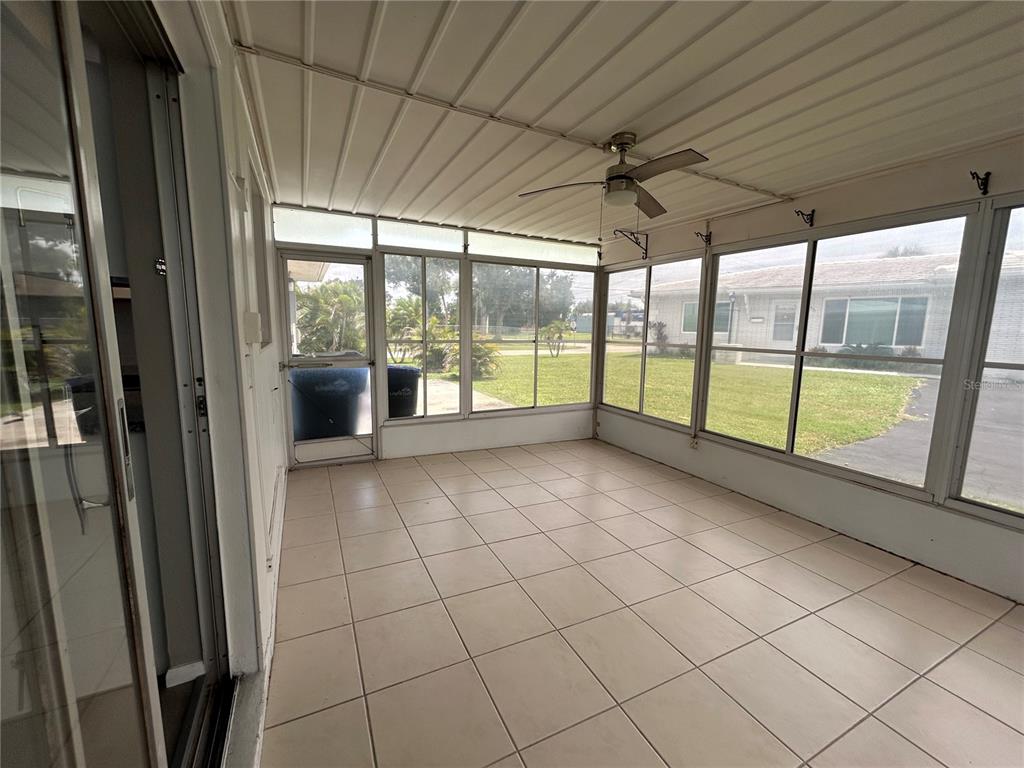 8521 Pickwick Road North Port, FL 34287 - Photo 9 of 19 a view of an empty room with a window