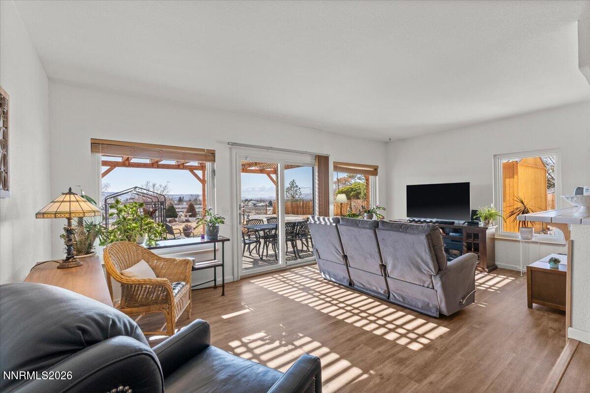 9580 Benedict Drive Sparks, NV 89441 - Photo 15 of 40 a living room with furniture and a flat screen tv