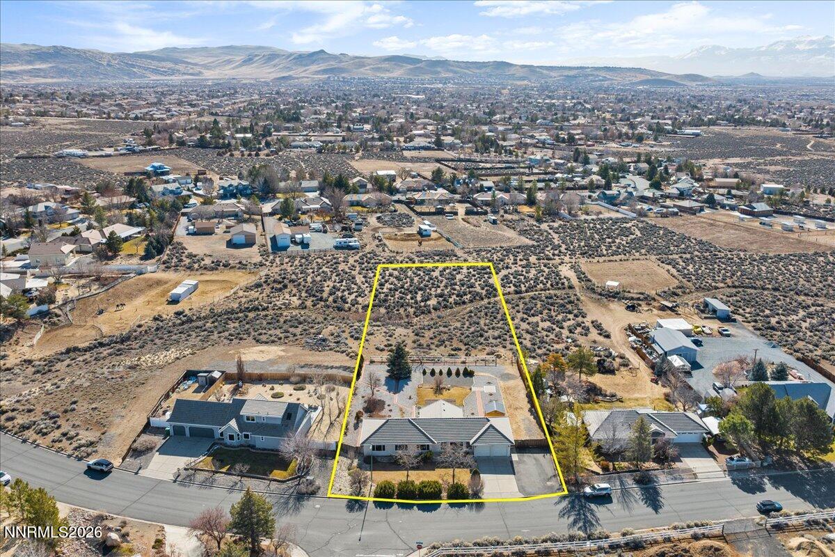 9580 Benedict Drive Sparks, NV 89441 - Photo 2 of 40 an aerial view of residential houses with outdoor space