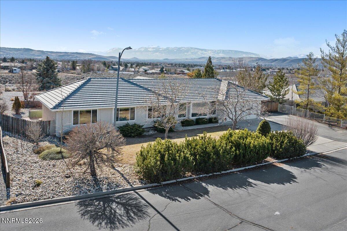 9580 Benedict Drive Sparks, NV 89441 - Photo 35 of 40 a front view of a house with a yard