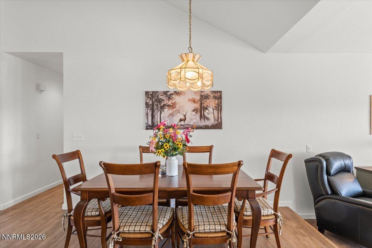 9580 Benedict Drive Sparks, NV 89441 - Photo 10 of 40 a dining room with furniture and window