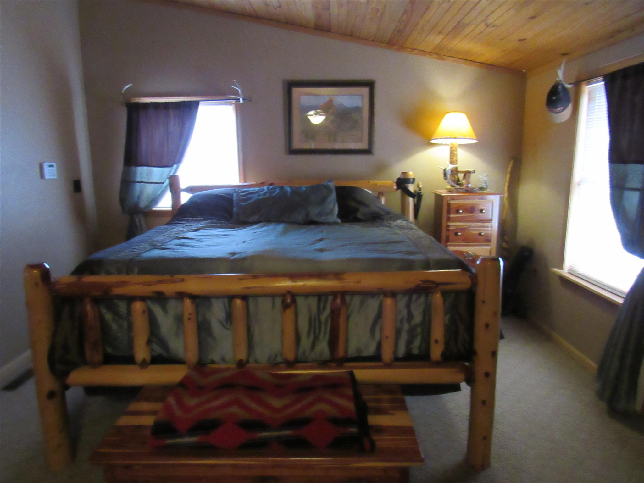 187 Th Hooper Lane McEwen, TN 37101 - Photo 26 of 28 a bedroom with a bed window and a flat screen tv