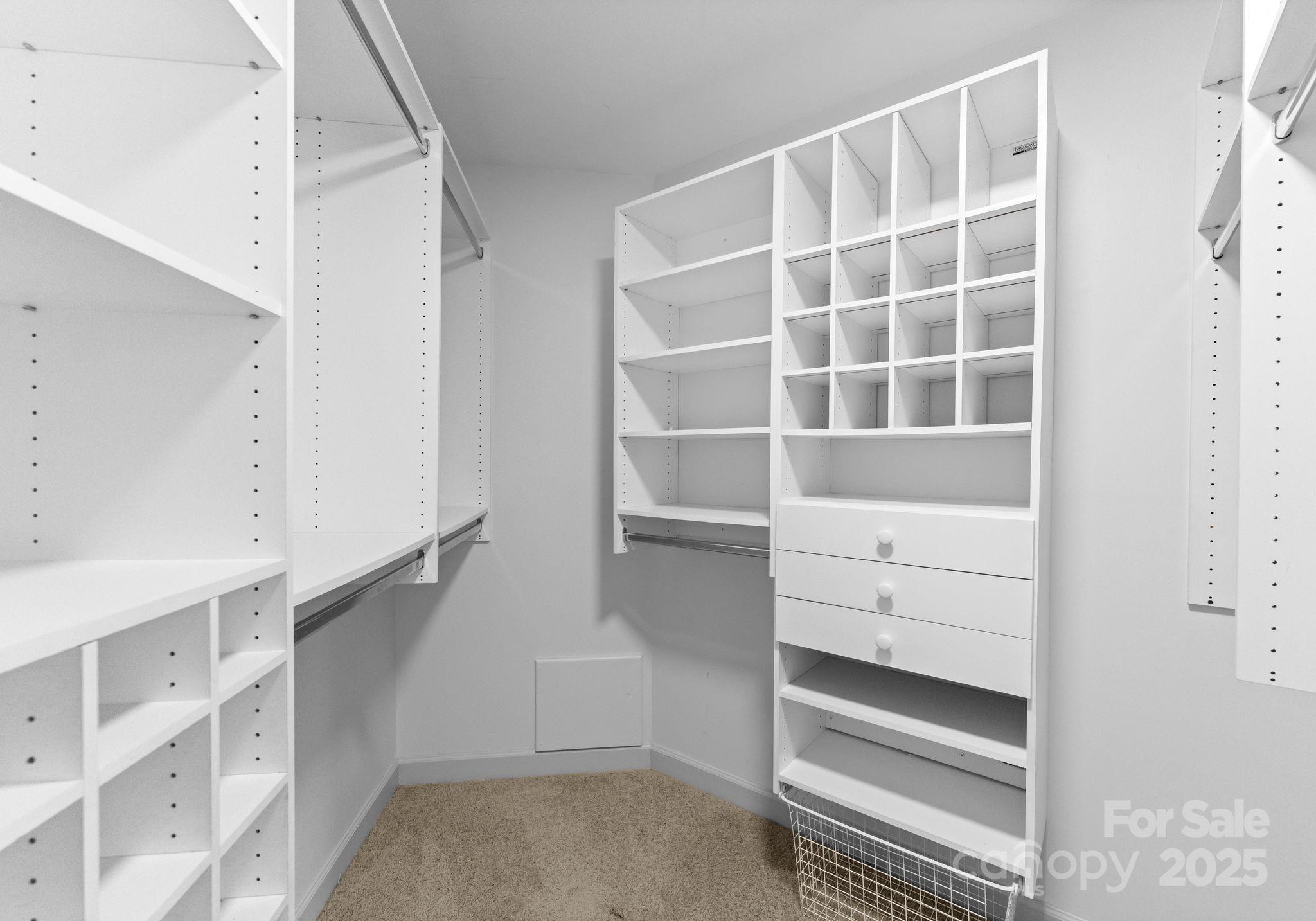 17811 Half Moon Lane, Unit E Cornelius, NC 28031 - Photo 22 of 42 a view of an empty walk in closet