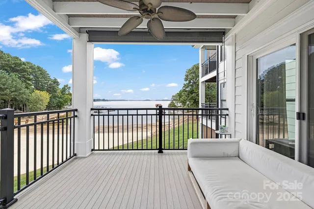 a balcony with wooden floor