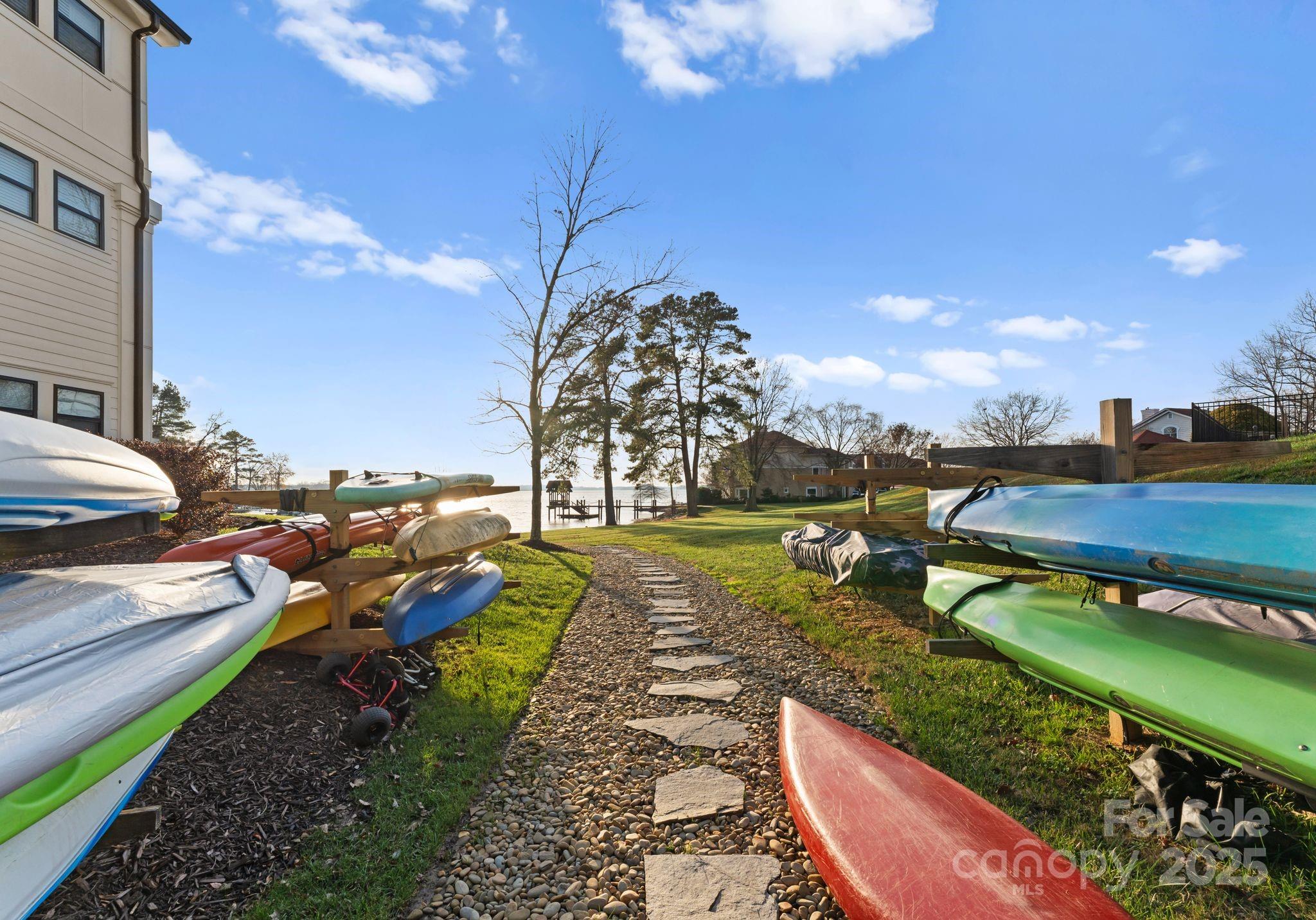 17811 Half Moon Lane, Unit E Cornelius, NC 28031 - Photo 33 of 42 a view of a swimming pool with a yard