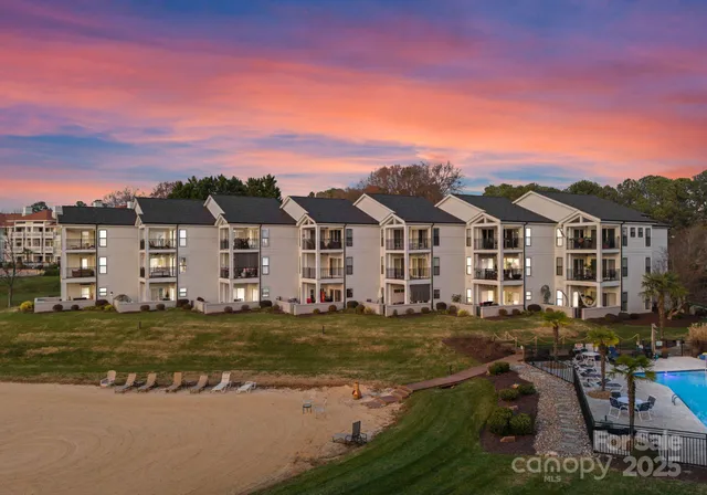 a view of a lake with a building in front of it