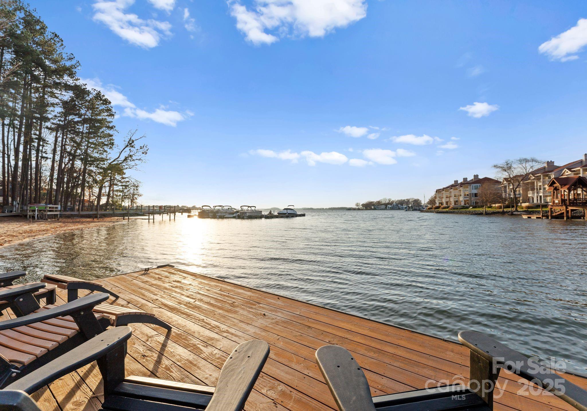 17811 Half Moon Lane, Unit E Cornelius, NC 28031 - Photo 38 of 42 a view of a lake with houses