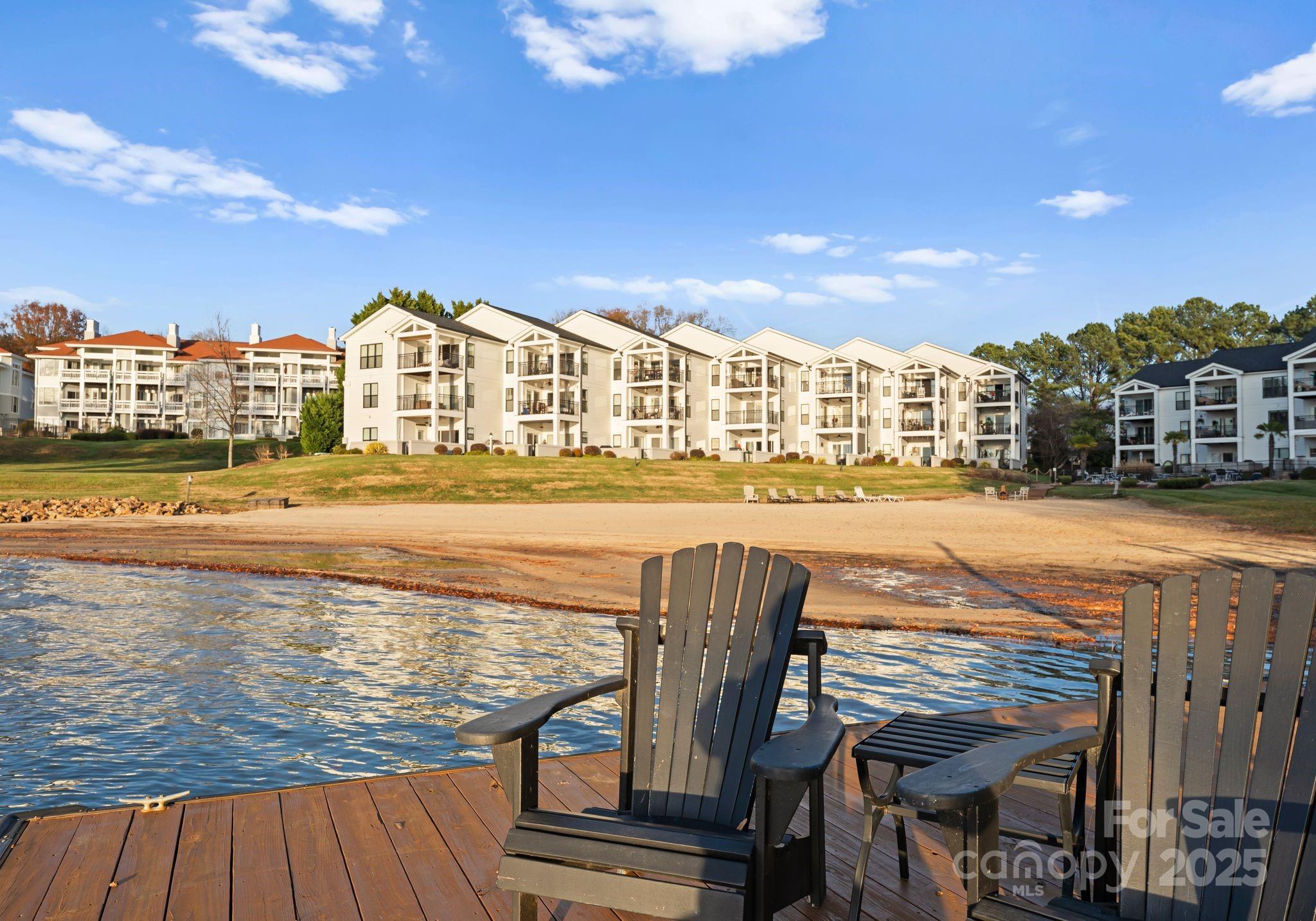 17811 Half Moon Lane, Unit E Cornelius, NC 28031 - Photo 39 of 42 a view of a swimming pool with an ocean view