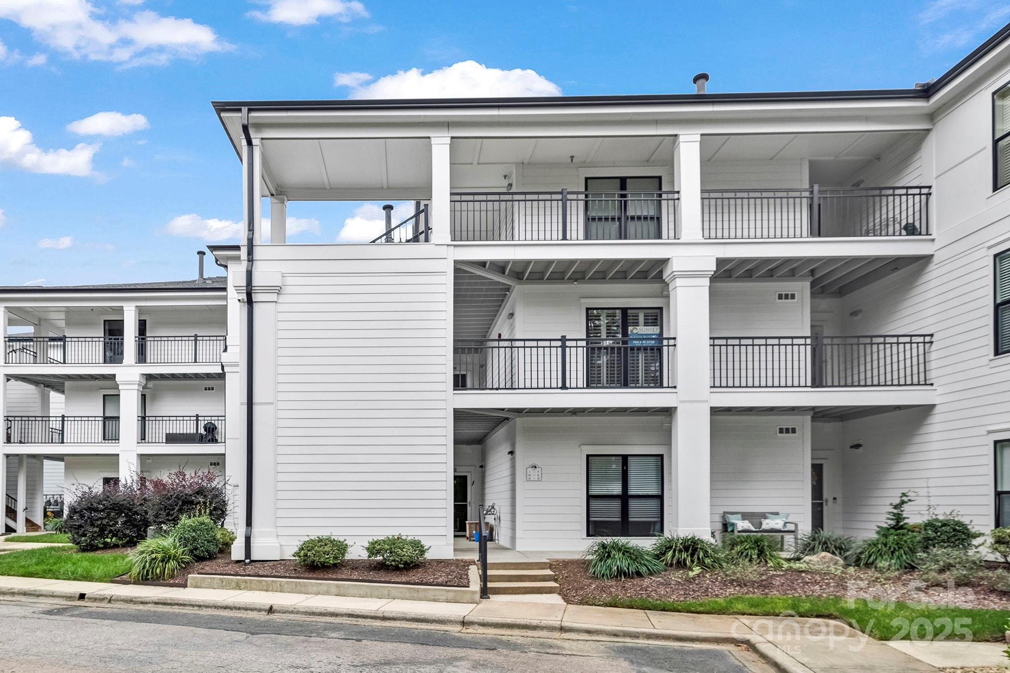 17811 Half Moon Lane, Unit E Cornelius, NC 28031 - Photo 8 of 42 a front view of a building