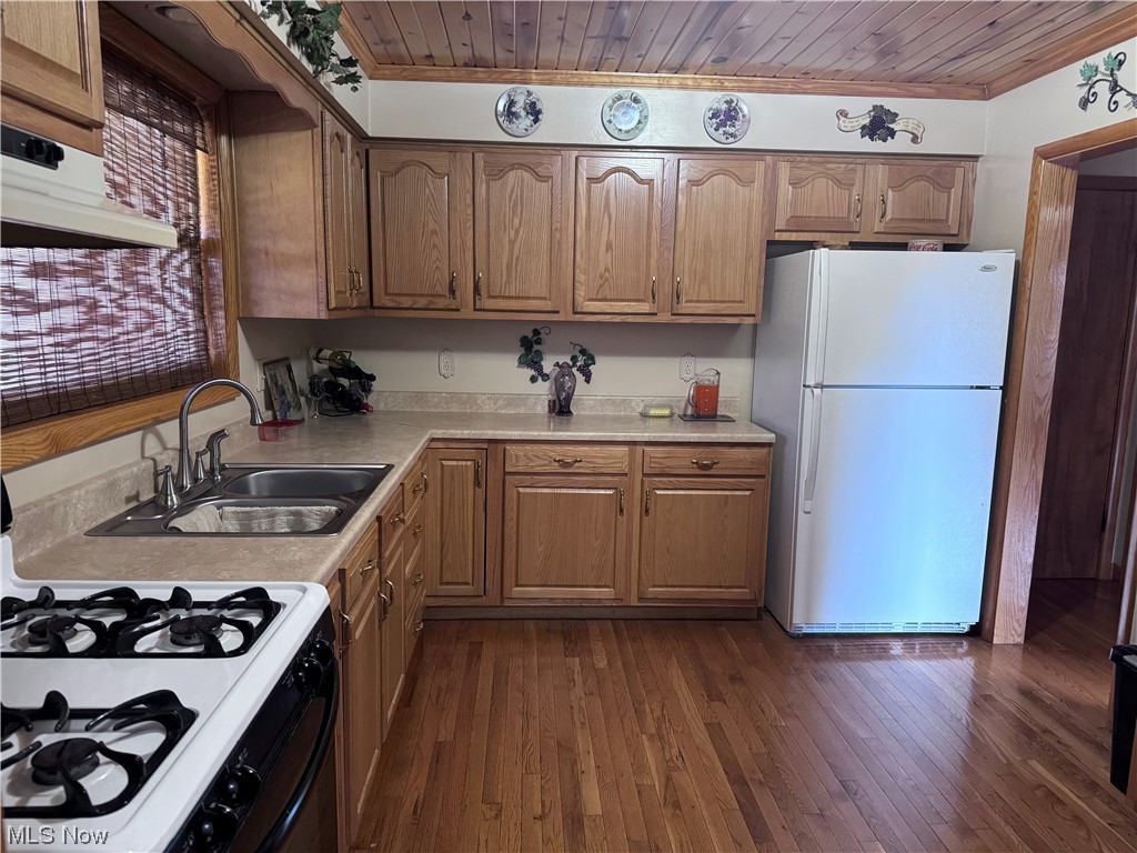 2361 Dutch Ridge Road Parkersburg, WV 26104 - Photo 12 of 17 Kitchen featuring range hood, wood ceiling, white refrigerator, and dark wood-type flooring