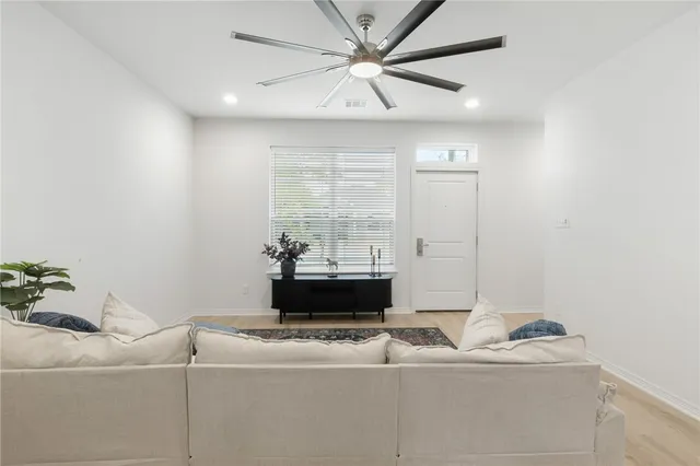 a bedroom with a bed and hallway