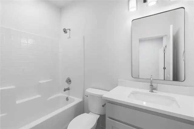 a balcony with furniture and potted plants