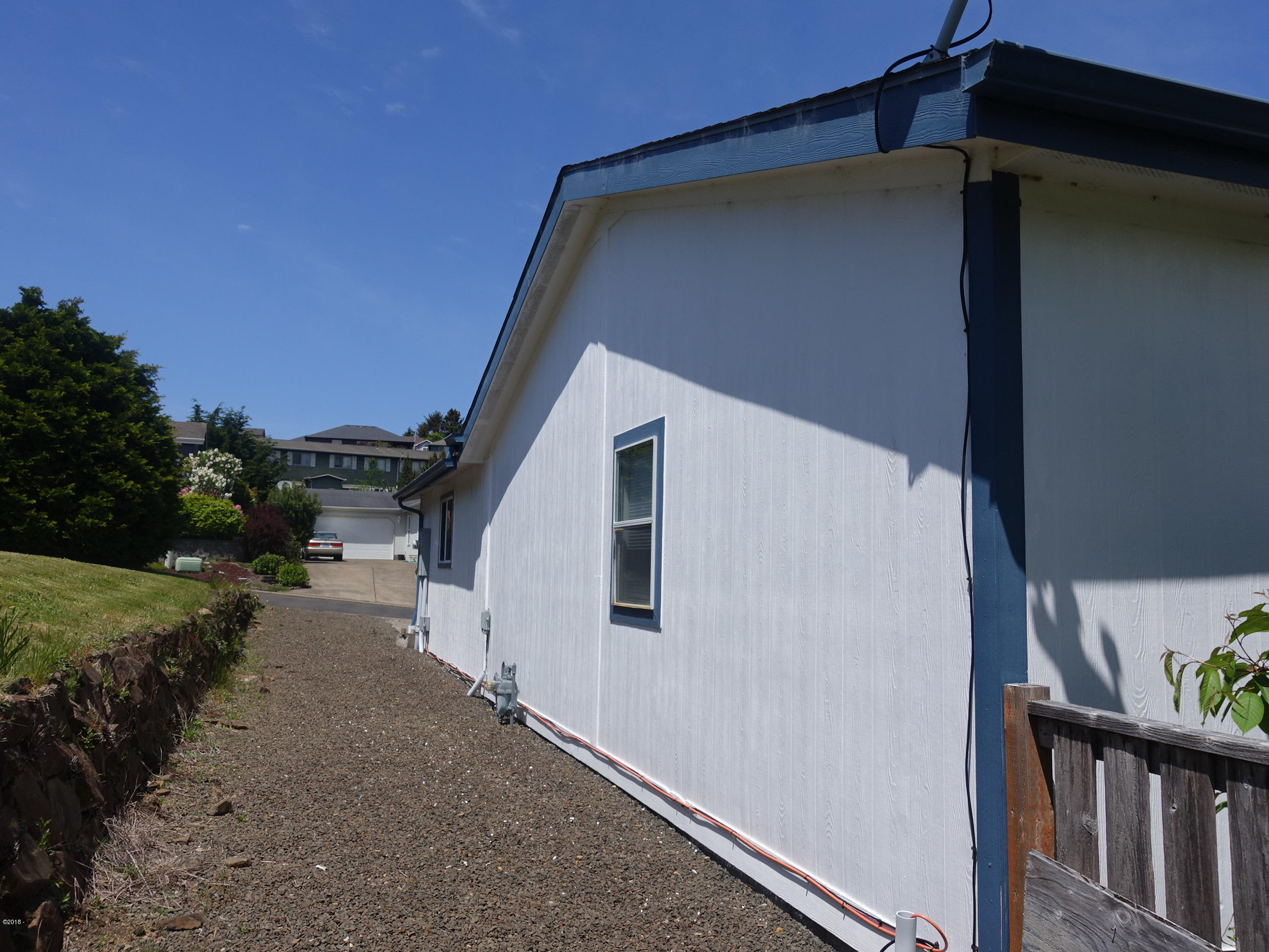 2889 Northeast 46th Loop Lincoln City, OR 97367 - Photo 5 of 5 Side yard