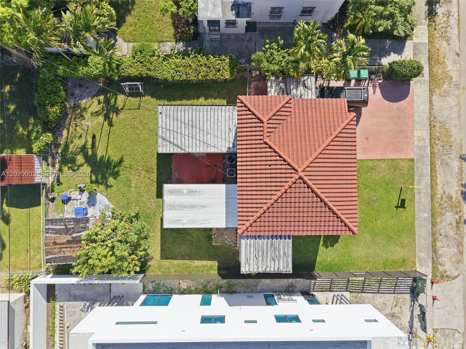 3750 Southwest 27th Street Miami, FL 33134 - Photo 39 of 41 a aerial view of a house with a yard
