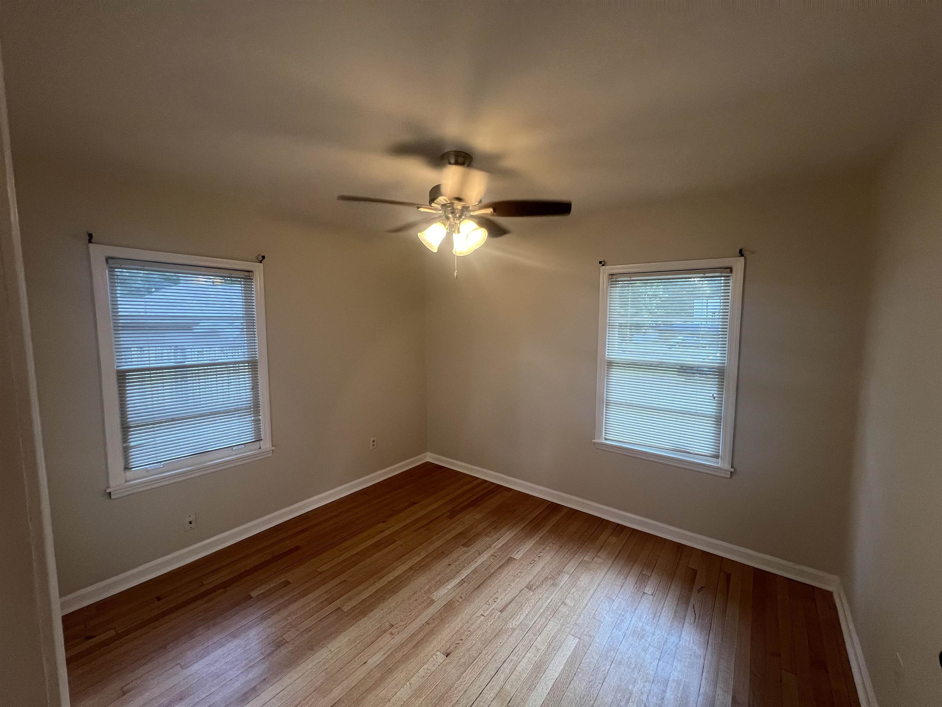 5131 Verne Road Memphis, TN 38117 - Photo 19 of 35 Unfurnished room with ceiling fan and light hardwood / wood-style floors