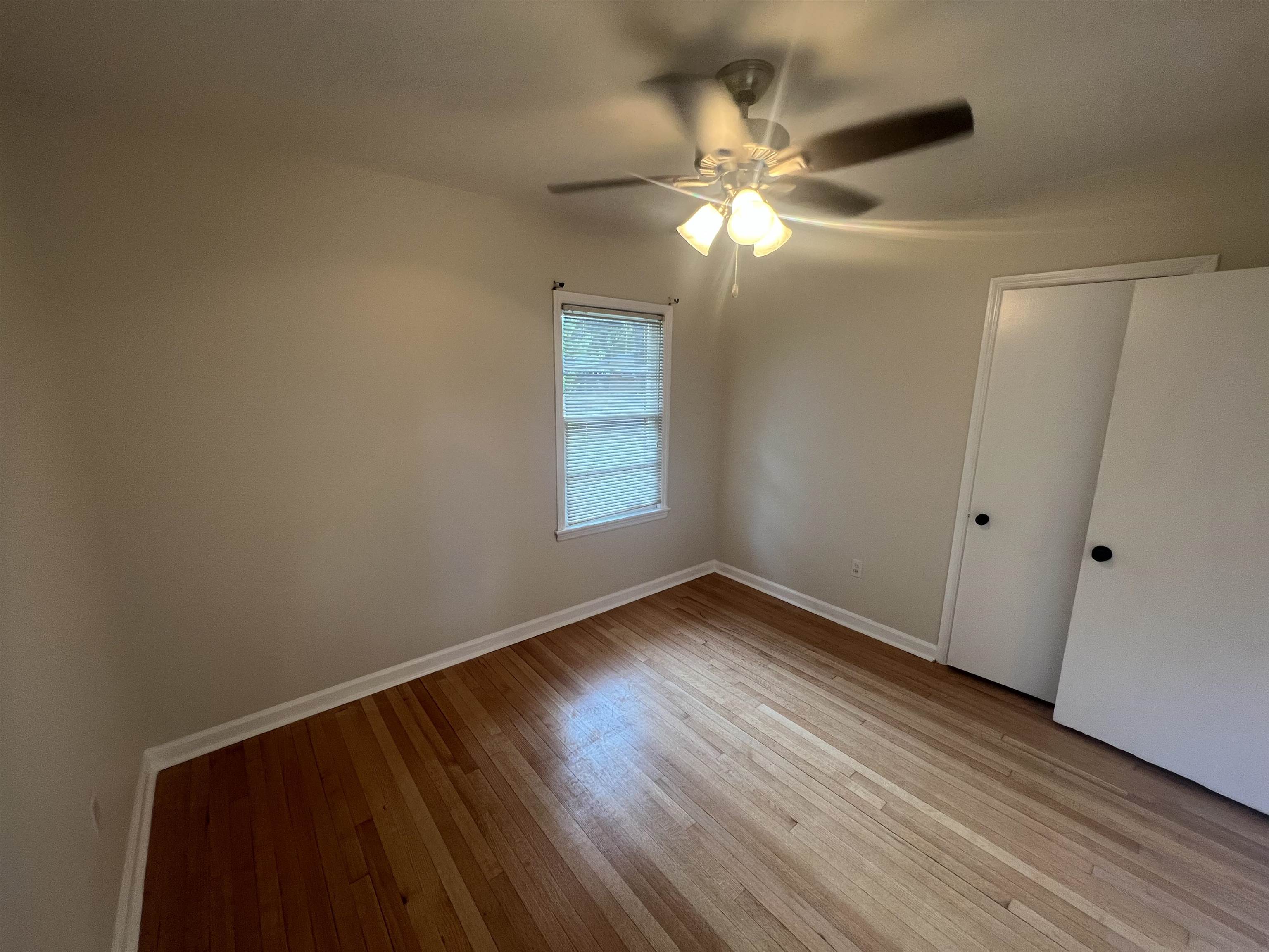 5131 Verne Road Memphis, TN 38117 - Photo 20 of 35 Unfurnished bedroom featuring ceiling fan and light hardwood / wood-style flooring