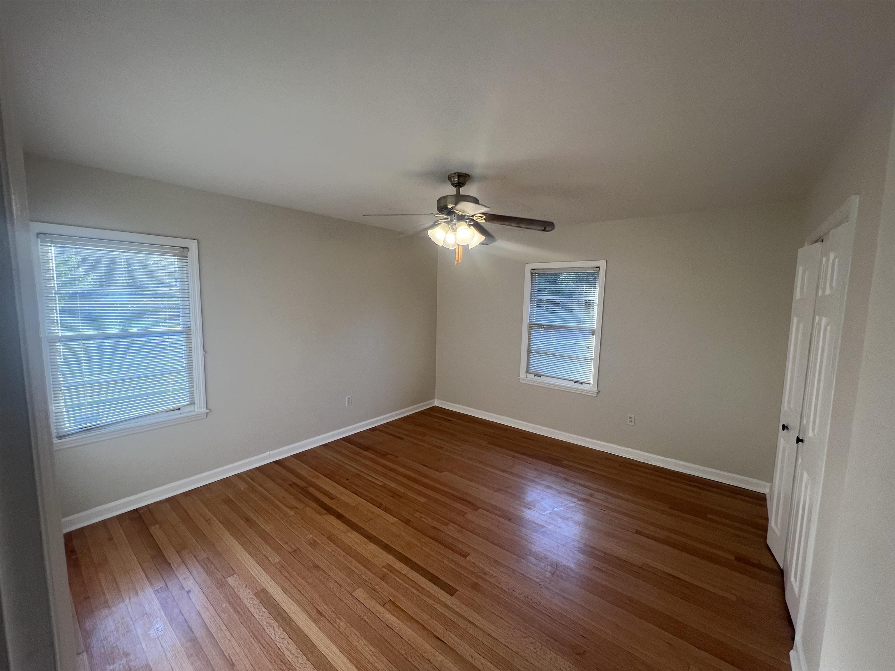 5131 Verne Road Memphis, TN 38117 - Photo 23 of 35 Spare room featuring hardwood / wood-style flooring and ceiling fan