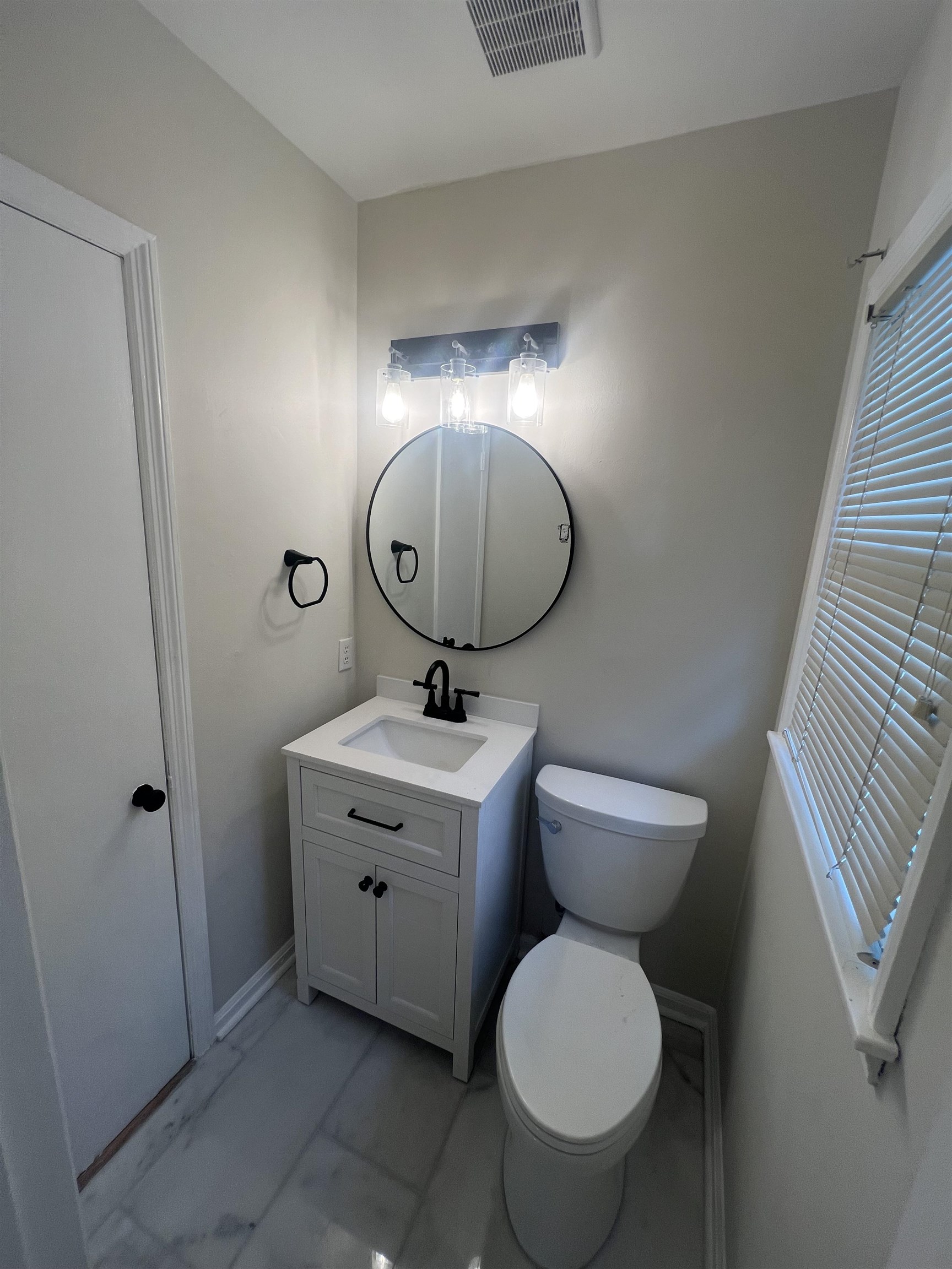 5131 Verne Road Memphis, TN 38117 - Photo 28 of 35 Bathroom with tile patterned flooring, toilet, and vanity