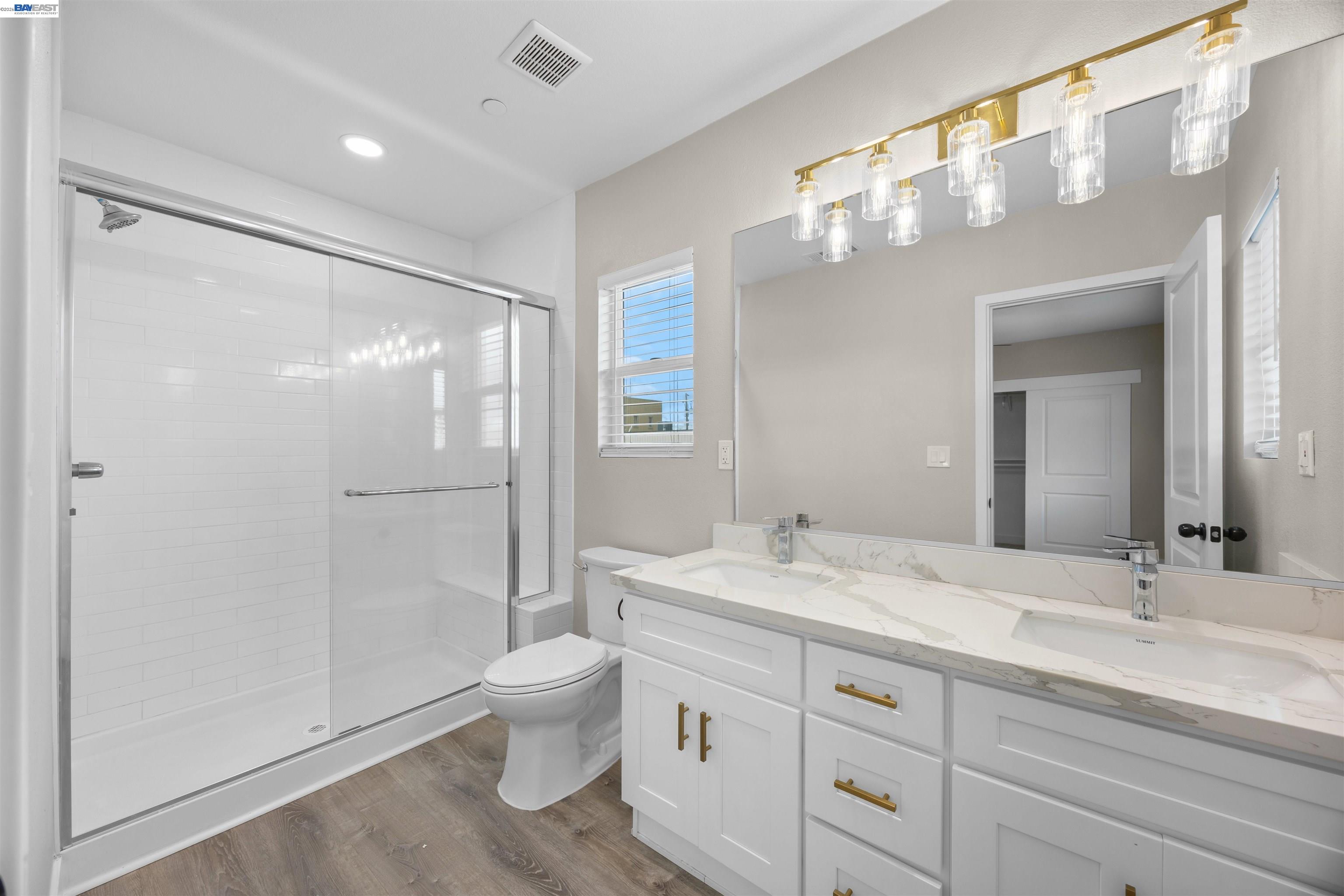 47 North 2nd Street Rio Vista, CA 94571 - Photo 11 of 21 a bathroom with a granite countertop sink toilet and shower
