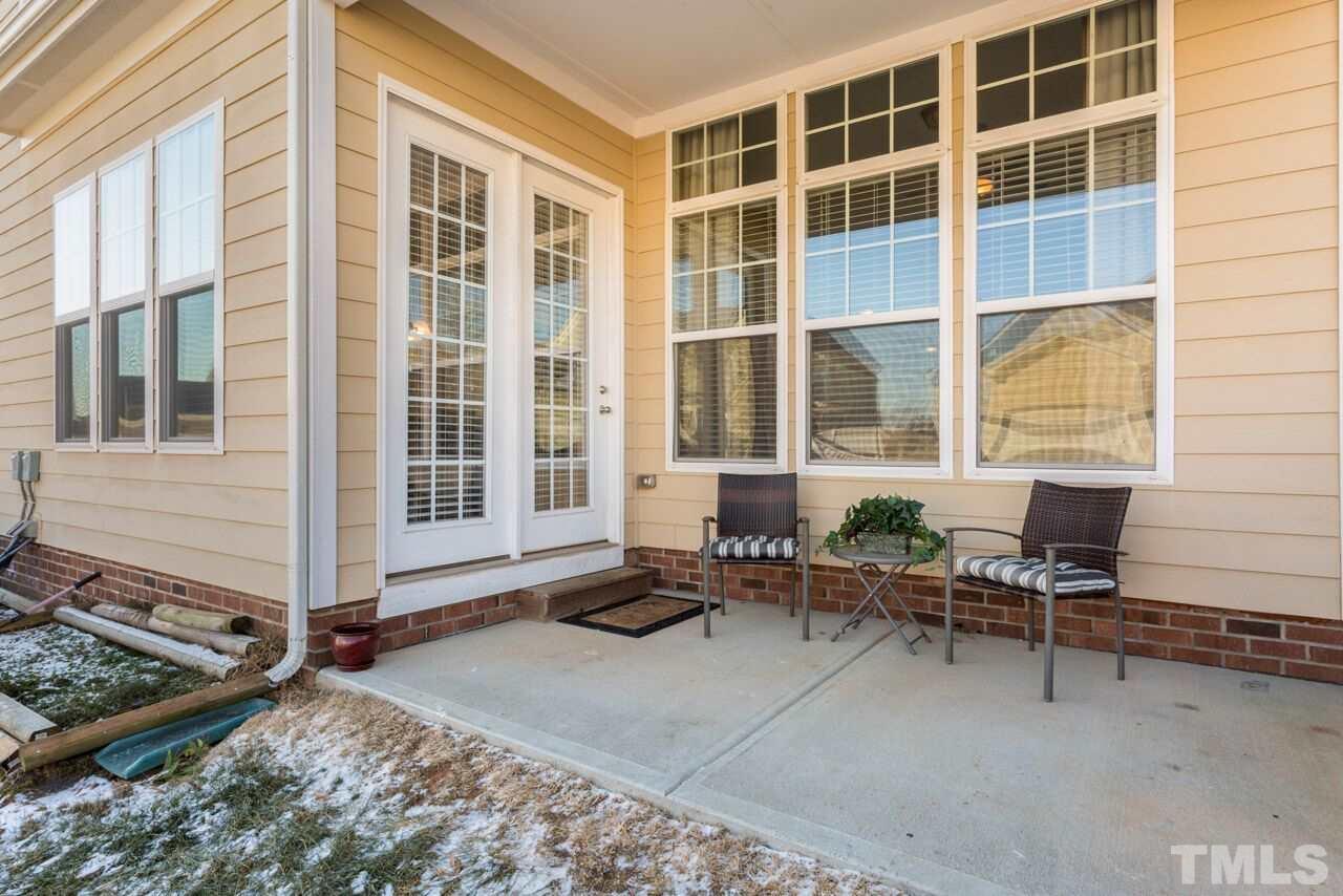 1217 Chapanoke Road Raleigh, NC 27603 - Photo 6 of 25 a view of a building with outdoor seating