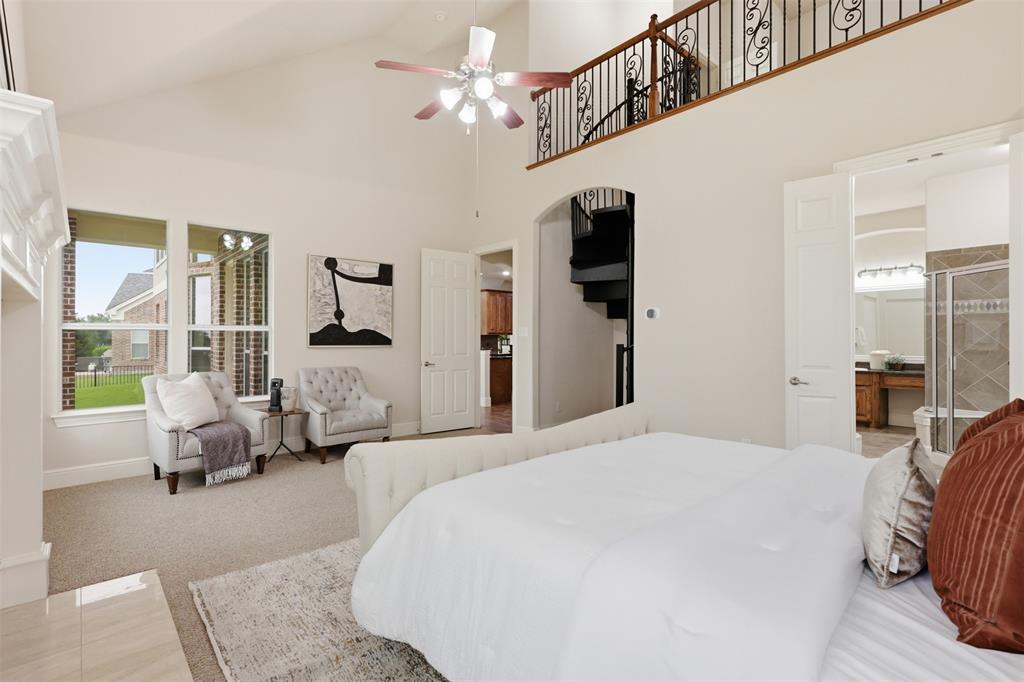 2841 Meadow Ridge Drive Prosper, TX 75078 - Photo 21 of 40 a bedroom with a bed couch and a window