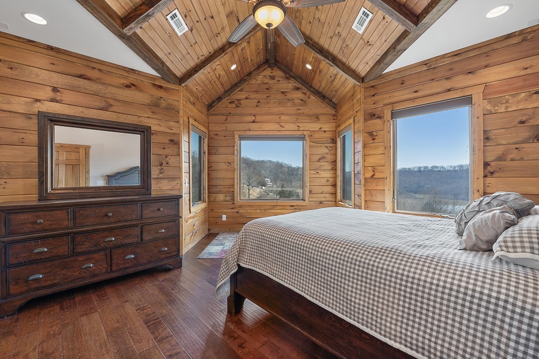 5320 Coconut Ridge Road Smithville, TN 37166 - Photo 22 of 47 a bedroom with a bed and a large window