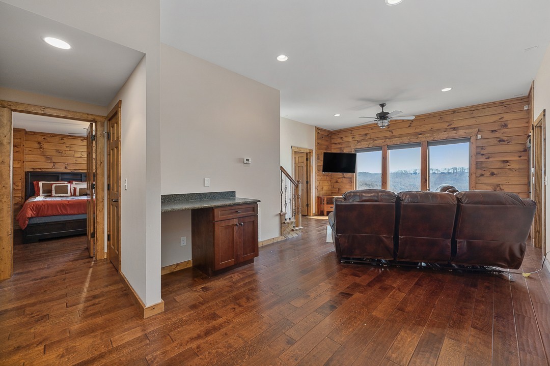5320 Coconut Ridge Road Smithville, TN 37166 - Photo 33 of 47 a living room with furniture and a fireplace