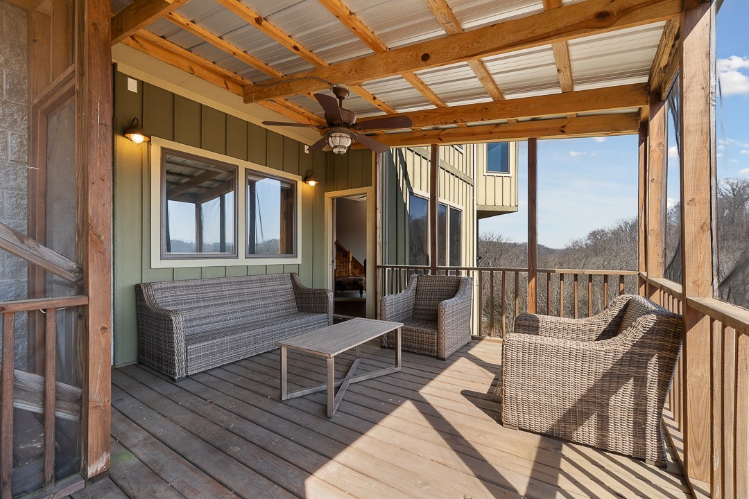 5320 Coconut Ridge Road Smithville, TN 37166 - Photo 34 of 47 a view of a chairs on the deck