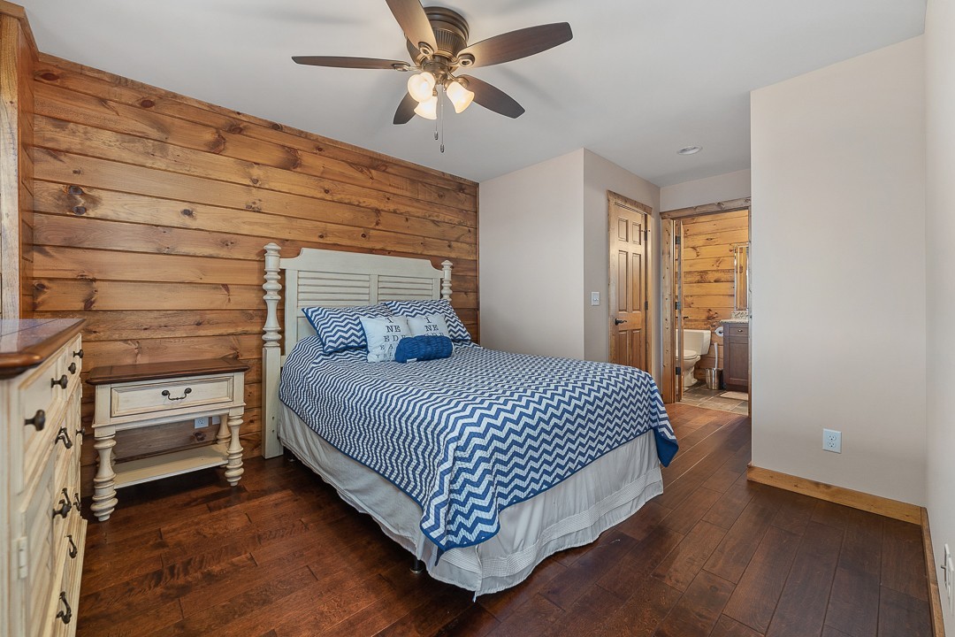 5320 Coconut Ridge Road Smithville, TN 37166 - Photo 38 of 47 a bedroom with a bed and a ceiling fan