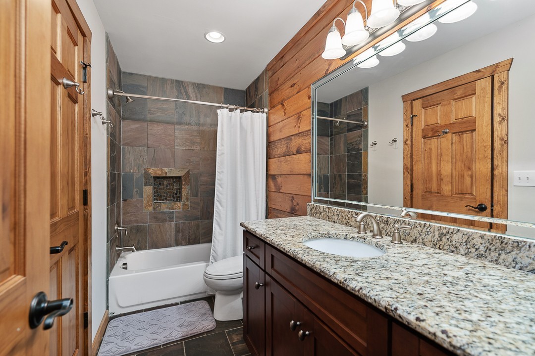5320 Coconut Ridge Road Smithville, TN 37166 - Photo 39 of 47 a bathroom with a granite countertop sink toilet and shower