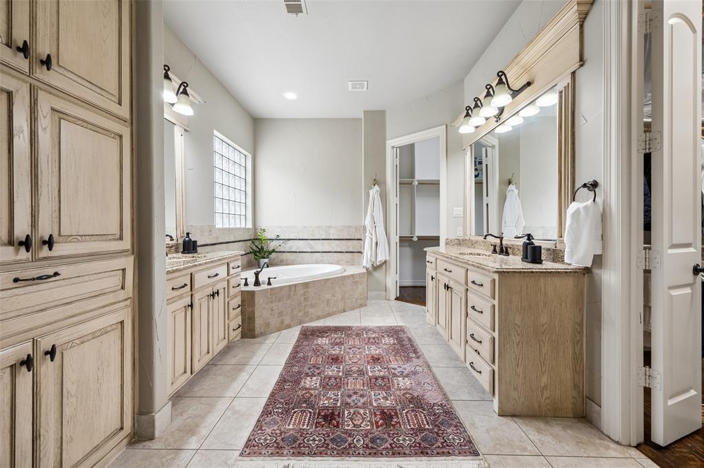 1608 Tuscan Ridge Circle Southlake, TX 76092 - Photo 18 of 36 a large white kitchen with a large window