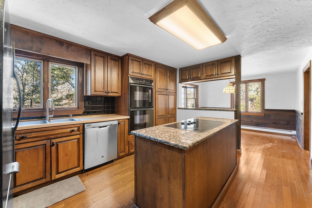 210 King Phillips Pathe Marshfield, MA 02050 - Photo 13 of 42 a spacious bathroom with a granite countertop sink and a large mirror