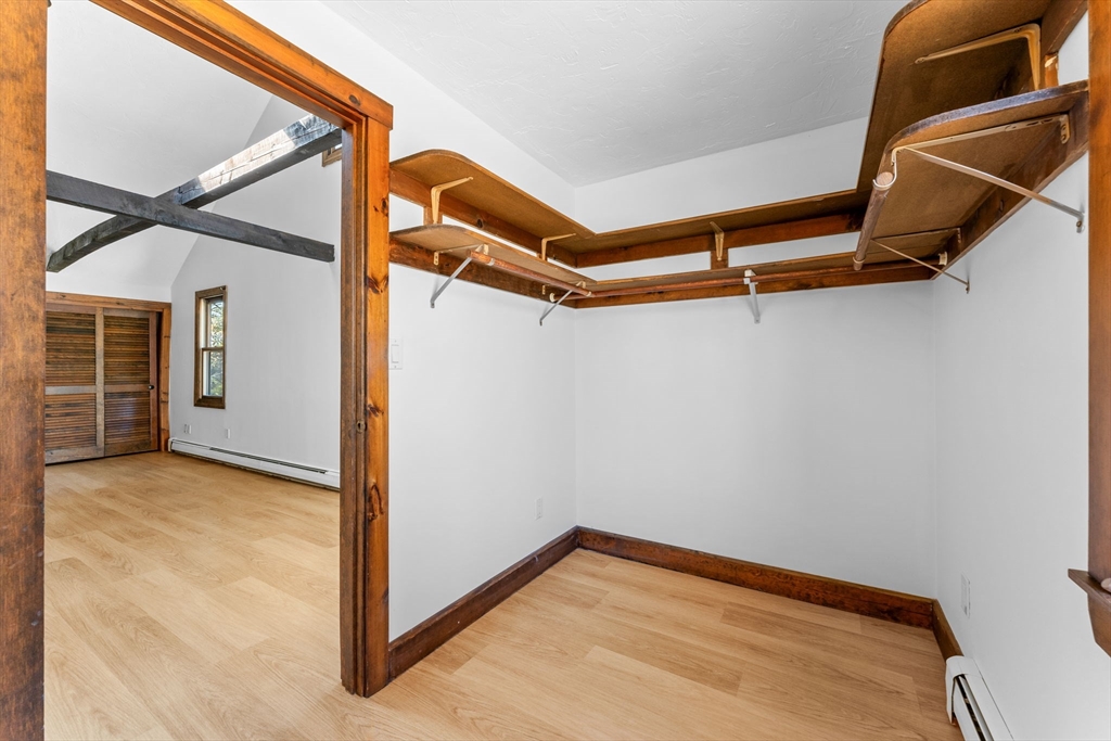 210 King Phillips Pathe Marshfield, MA 02050 - Photo 26 of 42 a view of a room with rack on the wall