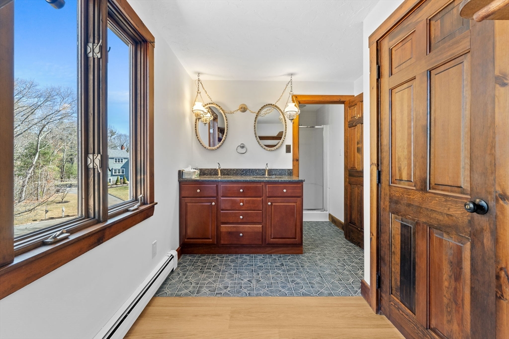 210 King Phillips Pathe Marshfield, MA 02050 - Photo 27 of 42 a view of a hallway with windows