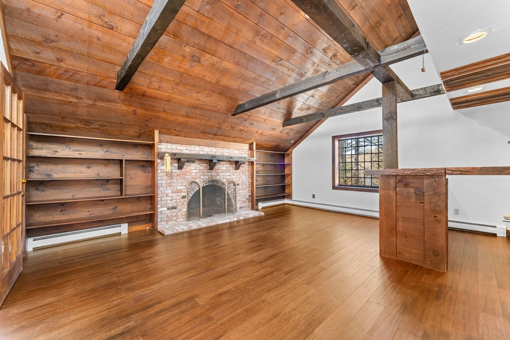 210 King Phillips Pathe Marshfield, MA 02050 - Photo 7 of 42 a view of a livingroom with wooden floor