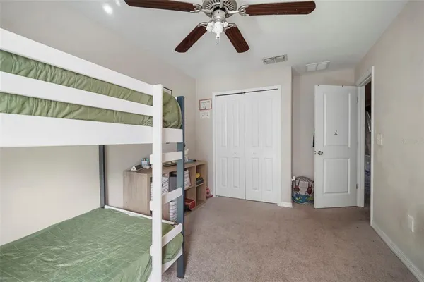 a view of a livingroom with a ceiling fan