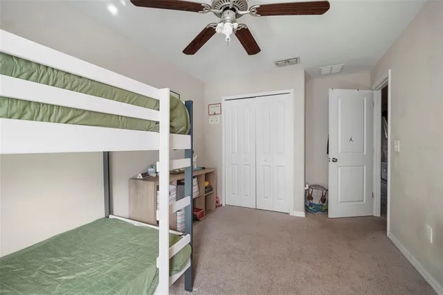 a view of a livingroom with a ceiling fan