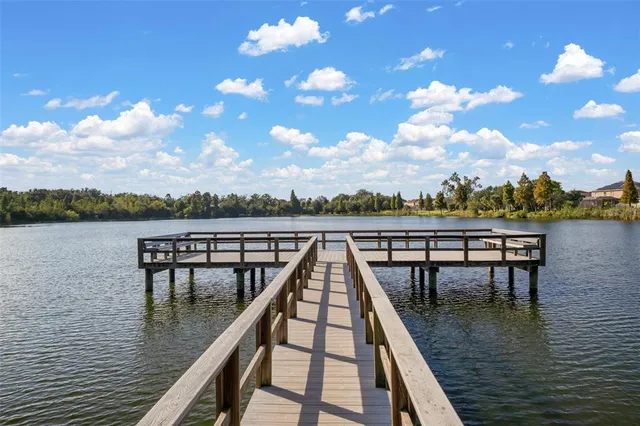 a view of a balcony with wooden floor