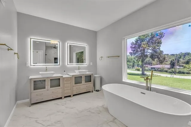 $489,000 | 7844 James A Reed Road, Kansas City, MO 64138