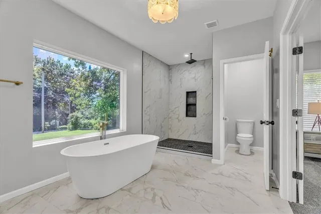 $489,000 | 7844 James A Reed Road, Kansas City, MO 64138