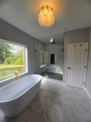 $489,000 | 7844 James A Reed Road, Kansas City, MO 64138