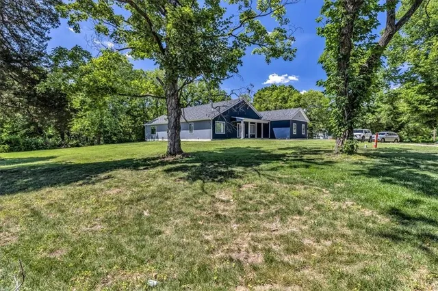 $489,000 | 7844 James A Reed Road, Kansas City, MO 64138