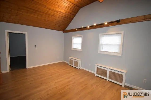 a kitchen with granite countertop a sink and a stove