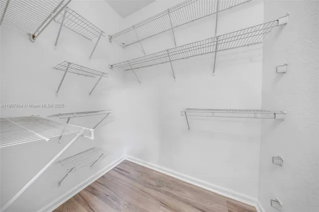 a view of a room with racks on the wall