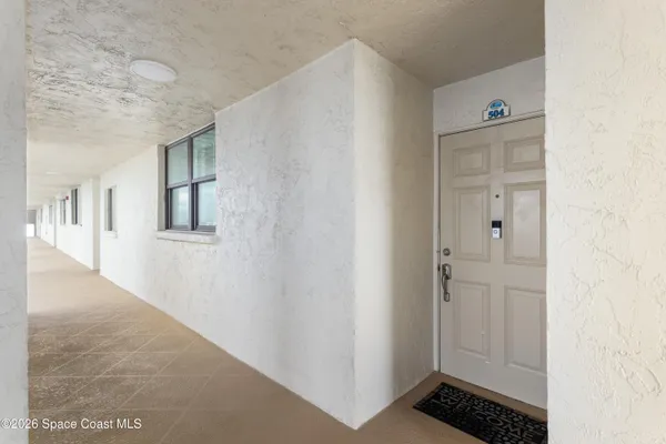 a kitchen with stainless steel appliances granite countertop a sink and dishwasher with wooden floor
