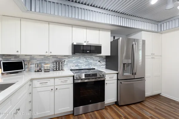 a white building with glass door