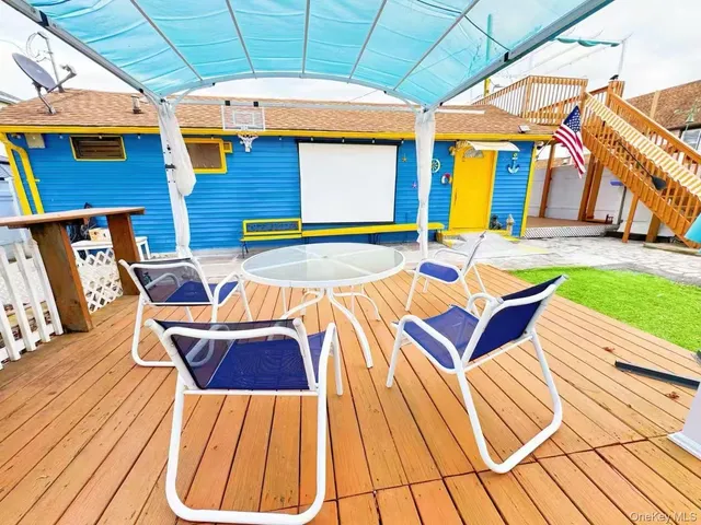 a view of a patio with swimming pool