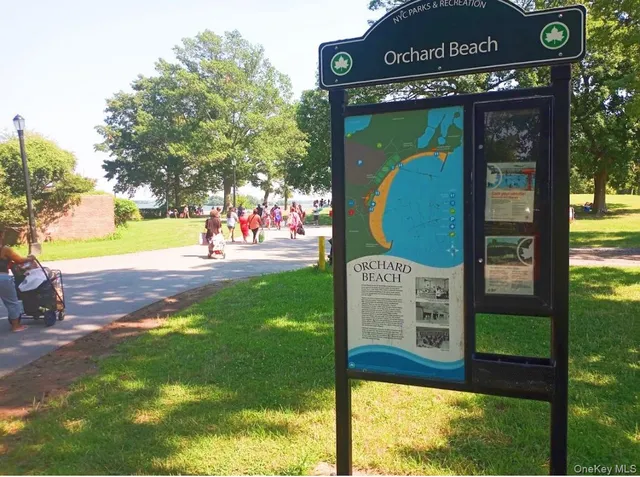 a view of a park with welcome board